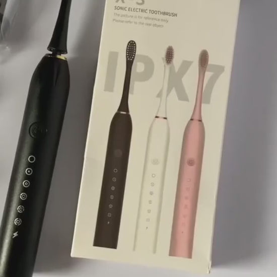 Powerful ultrasonic electric toothbrush showing multiple cleaning modes and wireless USB charging