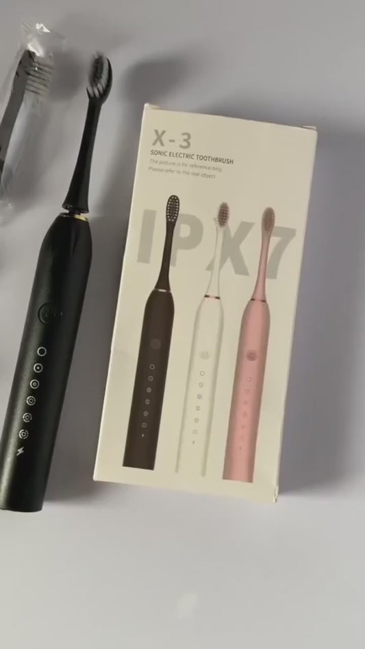 Powerful ultrasonic electric toothbrush showing multiple cleaning modes and wireless USB charging